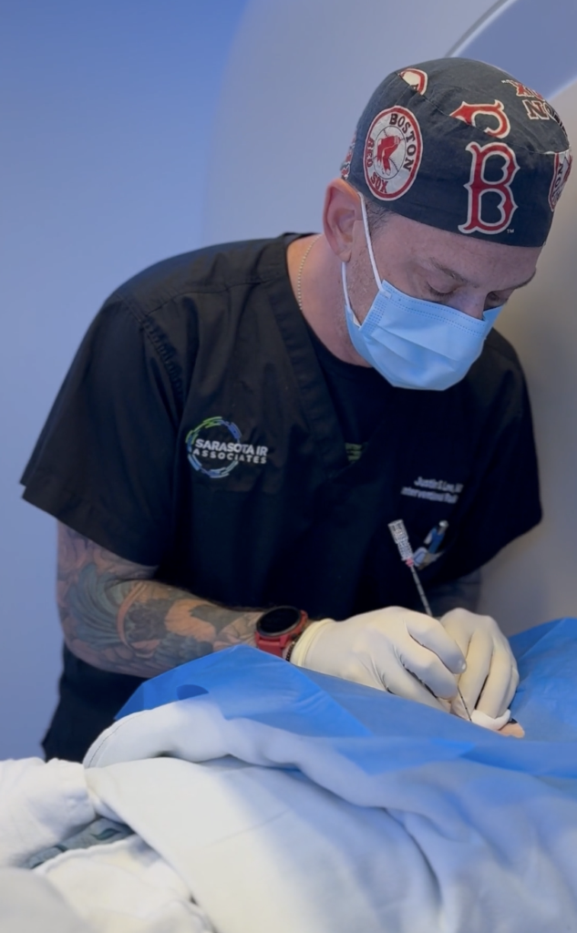 BPH Treatment Without Surgery: A Minimally Invasive Option for Enlarged Prostate Symptoms 1 Dr. Justin Lee performing a minimally invasive procedure at Sarasota IR Associates